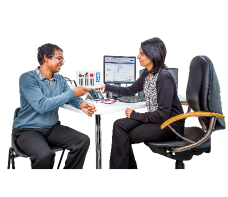 GPs A GP (doctor) and patient in the GP (doctor's) practice. The GP is handing her patient an information sheet.