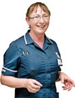A nurse A nurse standing in uniform.