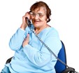 On Phone Person using a telephone and smiling.